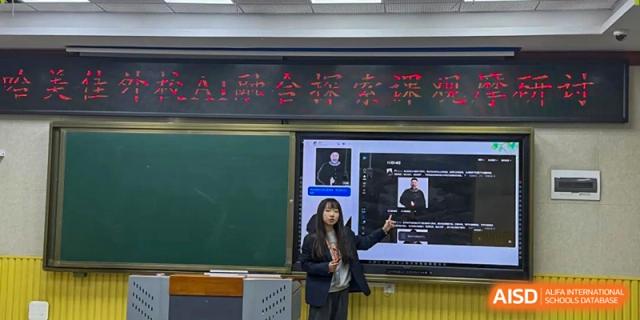 A teacher stands at the front of a classroom using a large interactive digital touchscreen during an AI integration lesson at Harbin Meijia Foreign Language School.