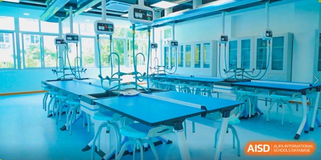 Modern science laboratory with clean workstations, advanced equipment, and bright lighting, supporting hands-on experiments, research learning, and STEM education at Xiamen ITG-SUIS High School