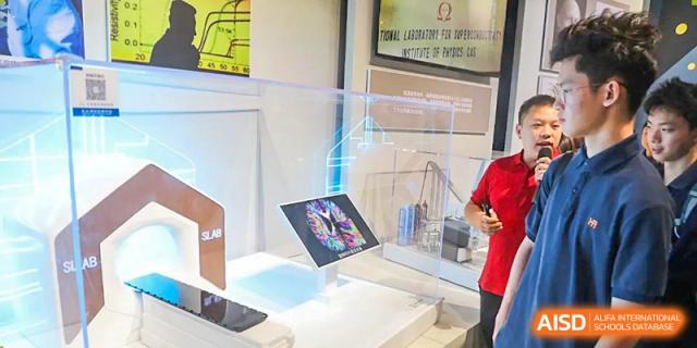 An interactive exhibit featuring a holographic or transparent screen display is shown during a high-tech science exhibition at Huafu International Department.