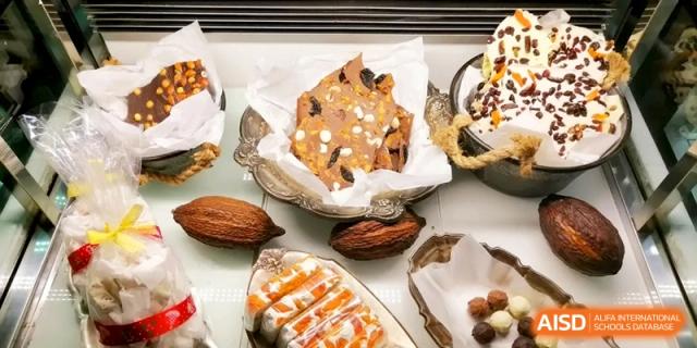 A selection of artisanal desserts including chocolate bark and truffles at the International School of Tianjin.