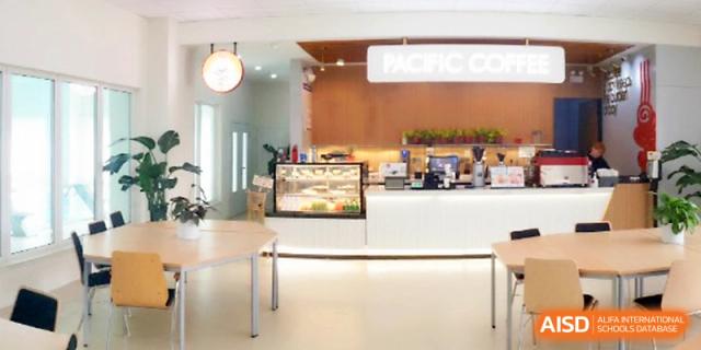 A stylish on-campus cafe and dining area offering snacks and refreshments for the community at Xi_an Hanova International School.