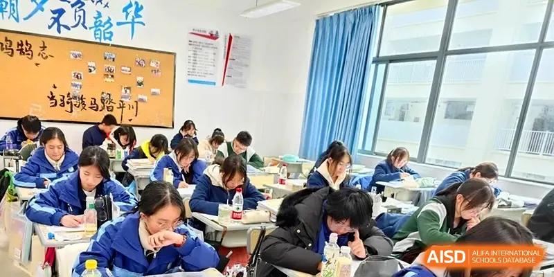 Students focus on their studies during a lecture in a bright classroom at The Guandu Experimental School Affiliated To Shanghai Normal University.