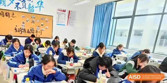 Students focus on their studies during a lecture in a bright classroom at The Guandu Experimental School Affiliated To Shanghai Normal University.