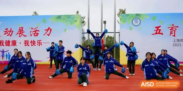 Cheerleaders in blue and white uniforms perform a high-energy routine at The Guandu Experimental School Affiliated To Shanghai Normal University.