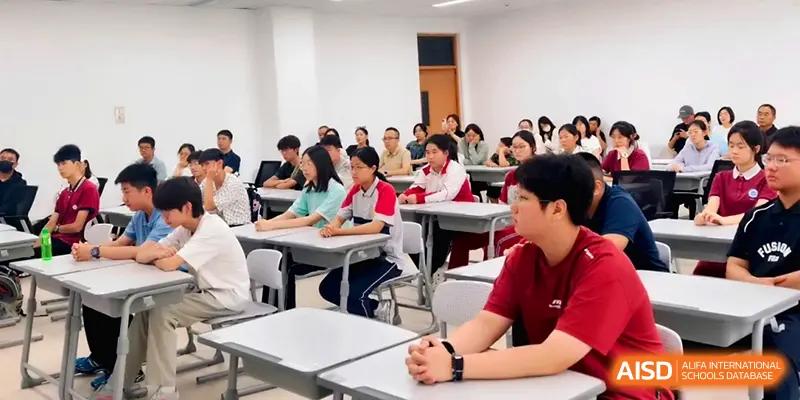 A classroom full of students sits attentively while facing the front during an instructional session at Xuzhou No.1 Middle School.
