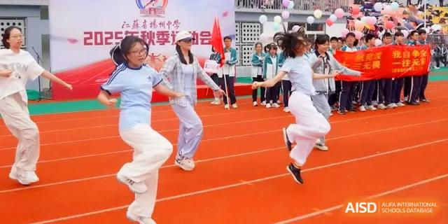 Students participate in a high-energy jump rope competition on an outdoor track at Yangzhou High School of Jiangsu Province.
