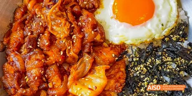 A Korean BBQ meal with chicken, egg, and seaweed served at Beijing Limai (International) School.