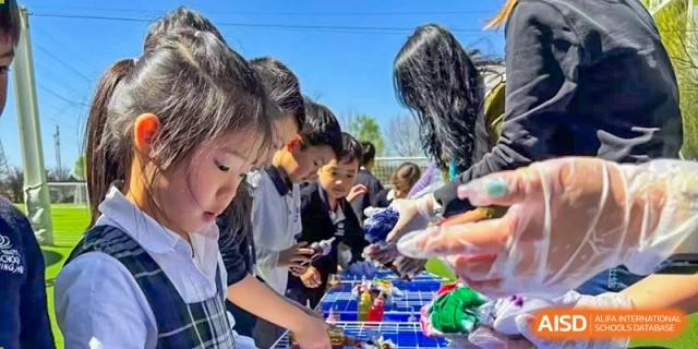 A photo showing a group of students doing a medical experiment, at The British School of Beijing, Shunyi.