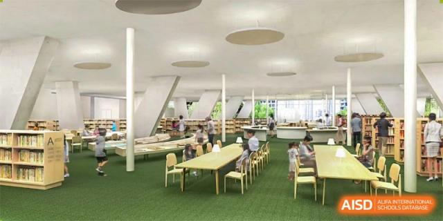 Ningbo Huamao International School students studying or working together in a bright, modern library.