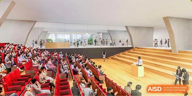 Ningbo Huamao International School students and staff seated in an auditorium for a school event.