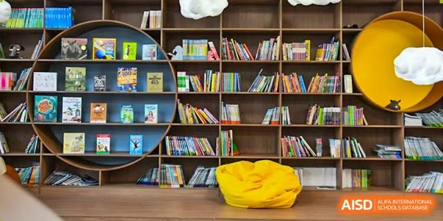 A library or bookshelf area at Qingdao MINGDE School.
