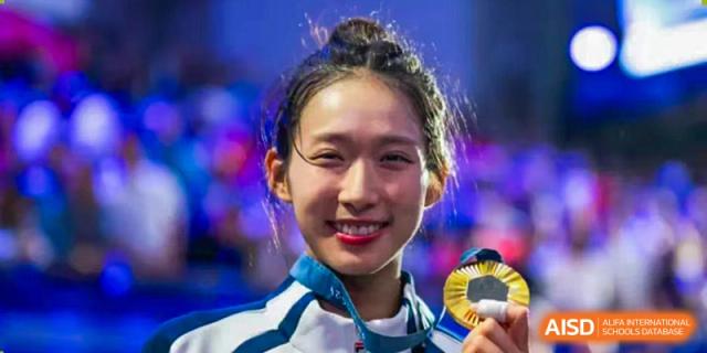 A close-up portrait of a female student from Qingdao MINGDE School.