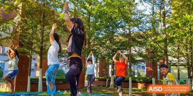 Students participate in an outdoor health or nutrition activity at Qingdao No.1 International School of Shandong Province (QISS).