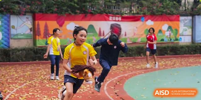 Students from Shenzhen Oasis International School participate in a race on a track.