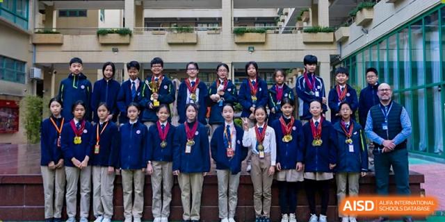 A group of students from Shenzhen Oasis International School wearing medals after a competition.