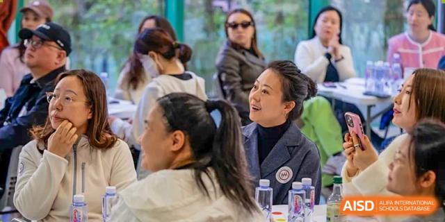 A group of teachers from Shenzhen Oasis International School attending an event.