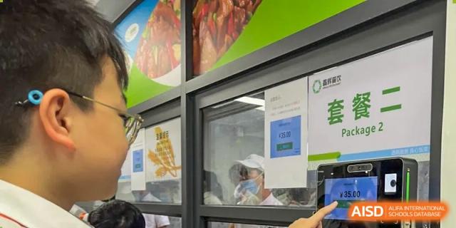A chef from Shenzhen Oasis International School working in the kitchen.