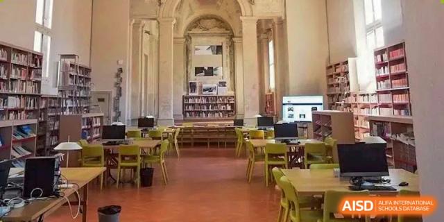 A beautiful and airy library with high ceilings and study tables at the World Leading Schools Association.