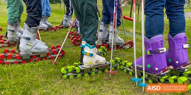 A group of students from EtonHouse International School Nanjing with roller skates attached to their shoes.
