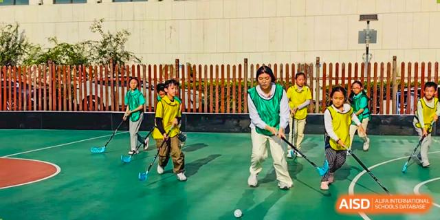 A group of students from EtonHouse International School Nanjing playing floorball.
