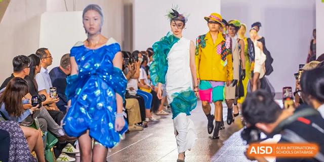 Young models walk down a runway during a fashion show at Vanke Meisha Academy.