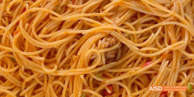 Another close-up of a portion of spaghetti with sauce. Beijing No.4 High School International Courses Jialian Campus.