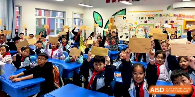 Students sit in a vibrant classroom filled with colorful decorations and educational materials at Urumqi Bayi High School.