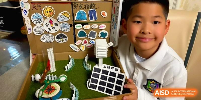 A close-up of a student posing next to a creative science project about solar energy at Beijing Financial Street Runze School